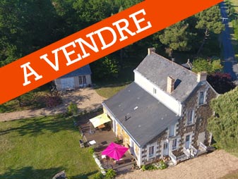 photographie aérienne d'une maison pour la vente